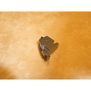 Trykfodsholder Huskylock 560ED